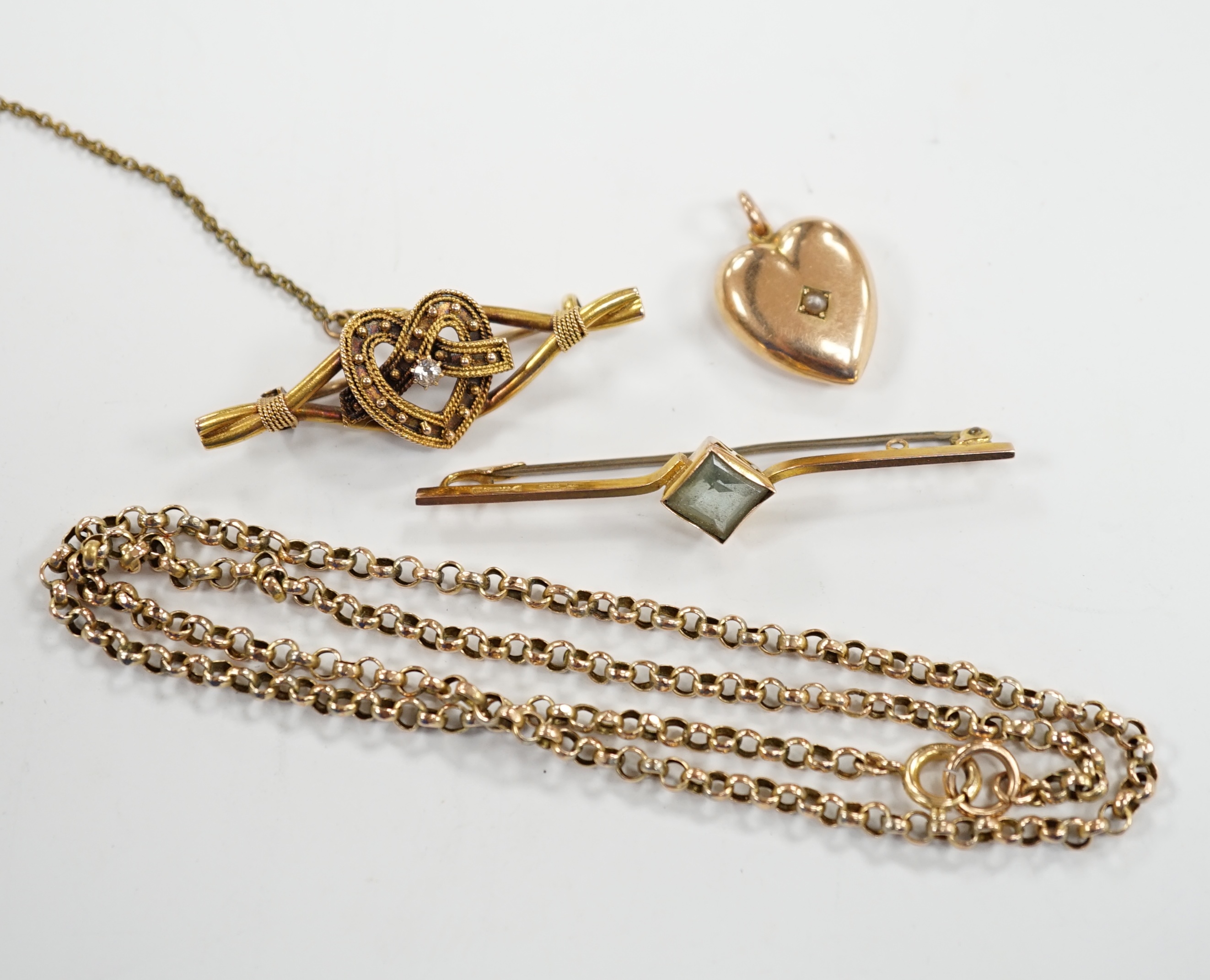 A 9ct chain, 42cm, a 15ct and diamond set heart shaped bar brooch, a 9ct and gem set bar brooch and a 9ct and seed pearl set heart shaped pendant.
